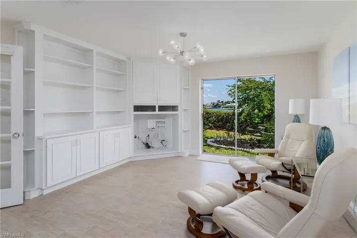 Family Room with sliders & electric shutter