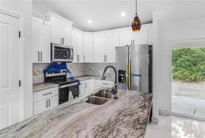 2712 2nd ST SW, LEHIGH ACRES FL 33976