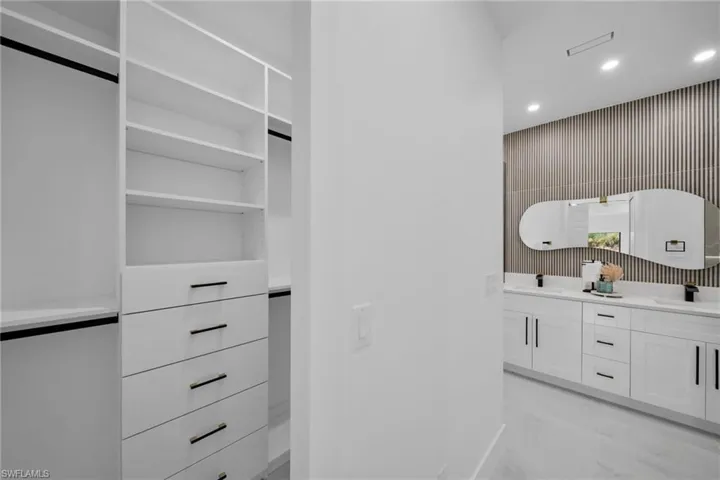 Walk in closet with a sink