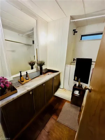 Virtually Staged: Bathroom with hardwood / wood-style flooring