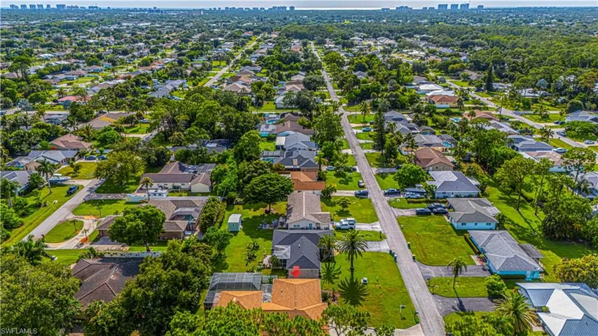 Aerial view of residential area featuring skyline