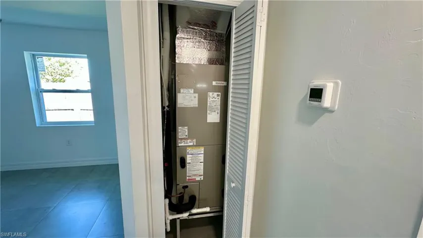 Utility room with a heating unit