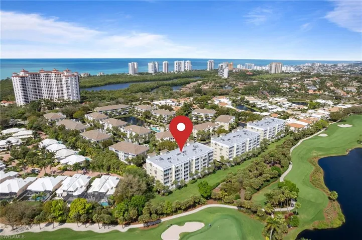 Aerial of 7687 Pebble Creek building.  This unit is the 4th floor in the "05" stack, second stack to the end of the building (to the left) with golf course and lake views.