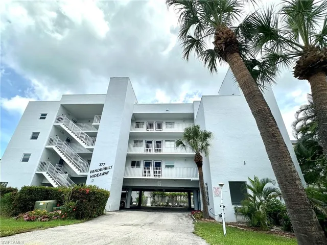 Amenities include a Covered Parking Garage under the Building