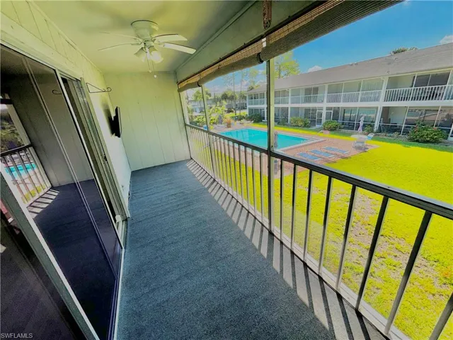 Balcony featuring ceiling fan