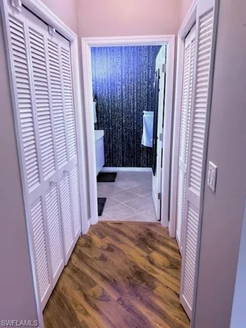 Corridor featuring light hardwood / wood-style flooring