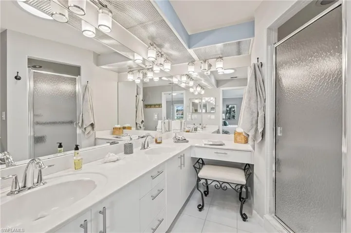 Double sinks, makeup counter, walk-in shower