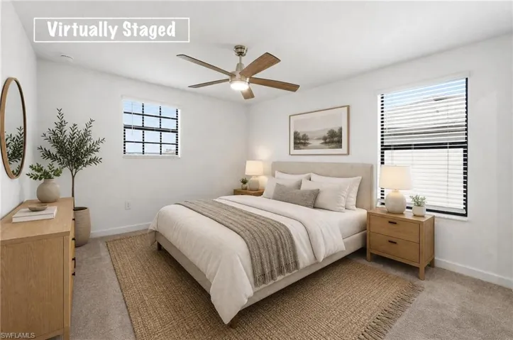 Second Floor- Carpeted flooring complemented by white walls and trim