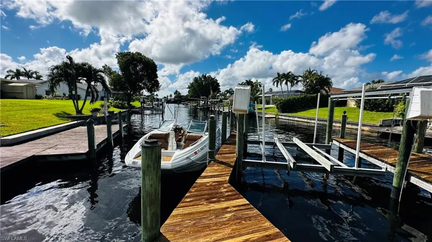 The dock and boat lift are ready to go for your dolphin sightseeing cruises and fishing trips to the islands.