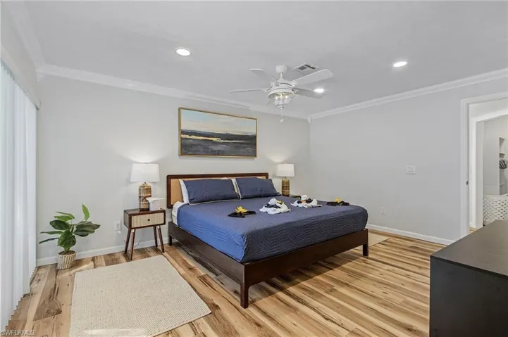 Master bedroom with sliders to the pool.