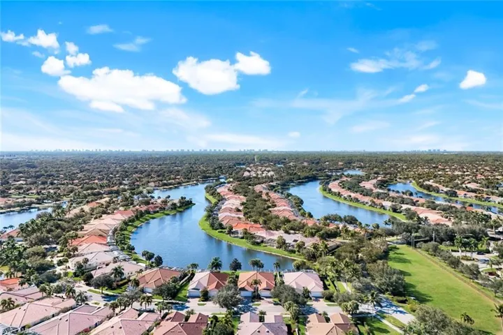 Aerial view of property and surrounding community.