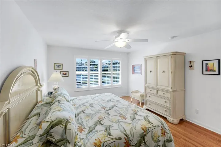 Bedroom featuring light wood finished floors and ceiling fan