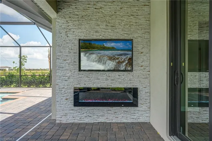 View of patio / terrace with a lanai