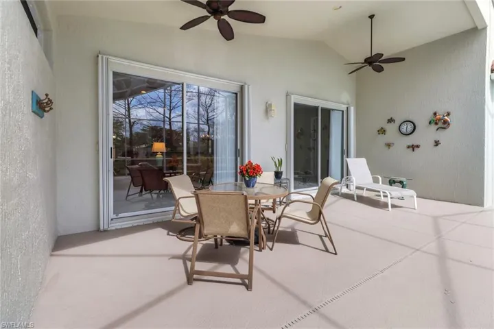 View of patio / terrace with ceiling fan and outdoor dining space