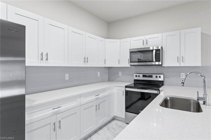 2201  KENNETH S AVE, LEHIGH ACRES, FL 33973