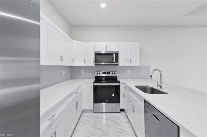2201  KENNETH S AVE, LEHIGH ACRES, FL 33973