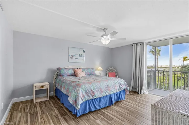Master bedroom with views of the beach preserve off the lanai