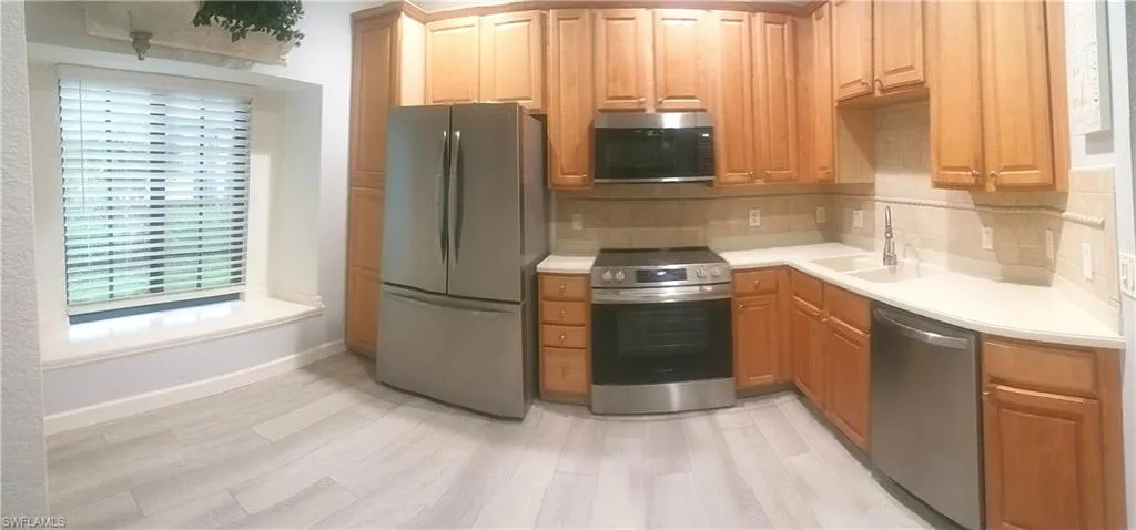 7725  Woodbrook  CIR, Naples, FL 34104
