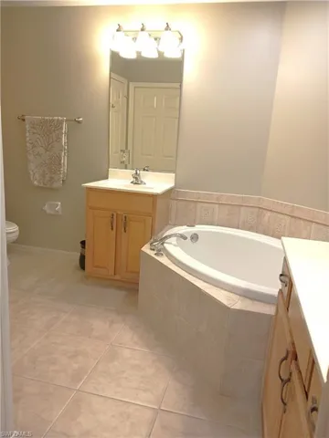 7725  Woodbrook  CIR, Naples, FL 34104