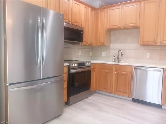 7725  Woodbrook  CIR, Naples, FL 34104