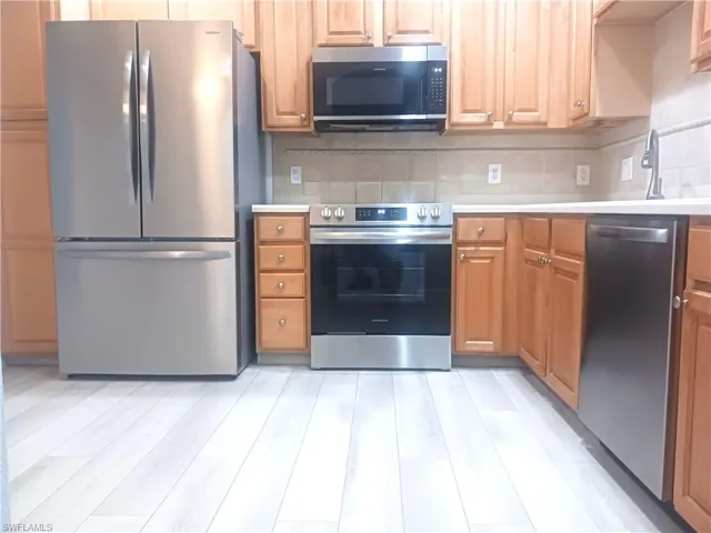 7725  Woodbrook  CIR, Naples, FL 34104