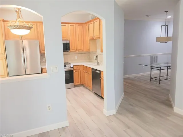 7725  Woodbrook  CIR, Naples, FL 34104