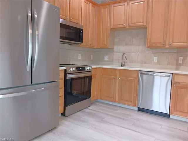 7725  Woodbrook  CIR, Naples, FL 34104