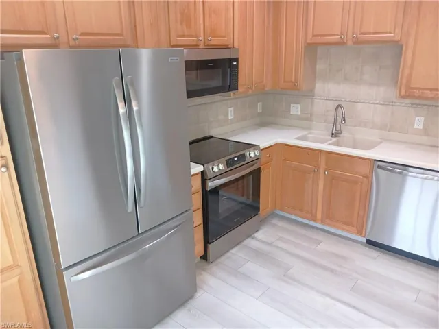 7725  Woodbrook  CIR, Naples, FL 34104