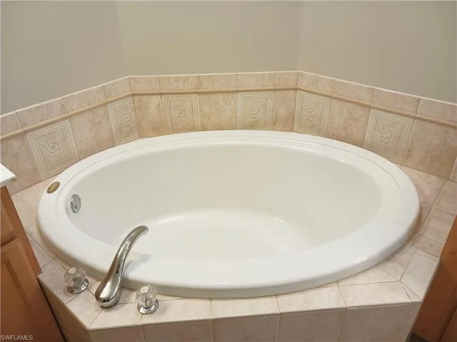 7725  Woodbrook  CIR, Naples, FL 34104