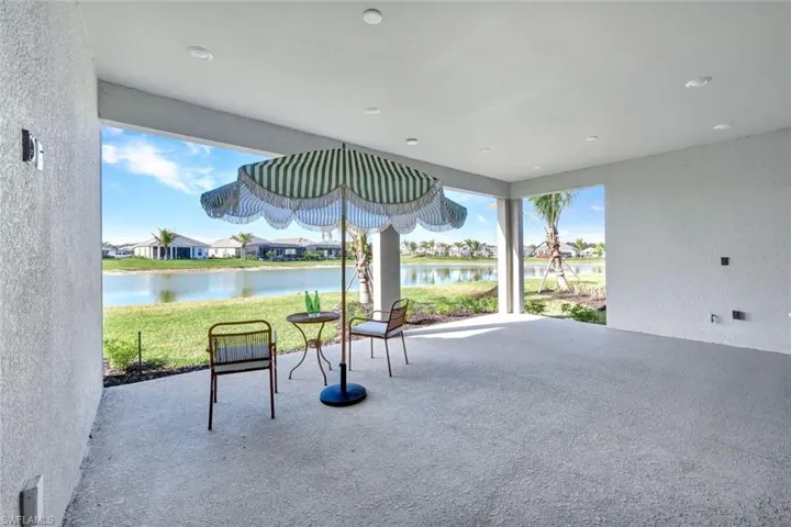 View of patio / terrace with a water view