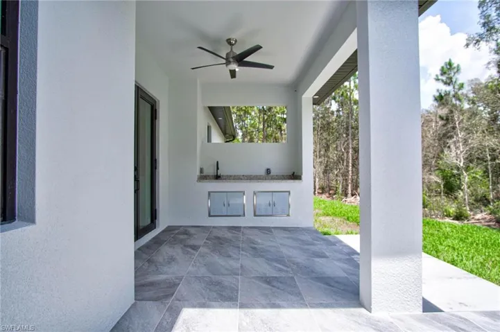 View of patio / terrace with ceiling fan