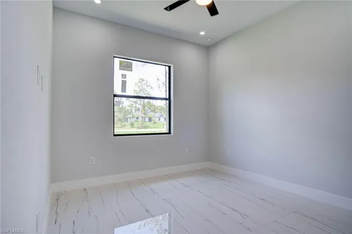 Unfurnished room with ceiling fan