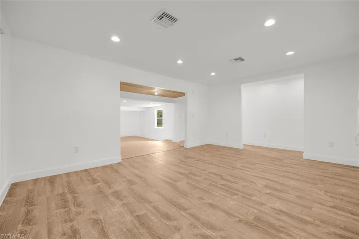 Spare room with light hardwood / wood-style floors
