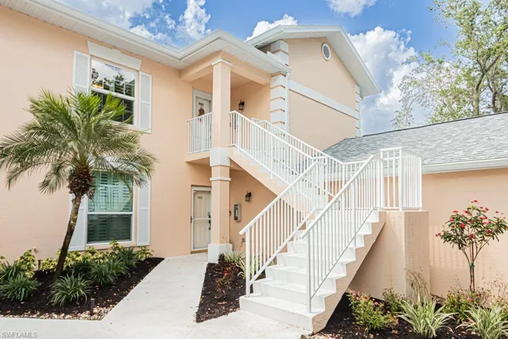Doorway to property with stucco siding