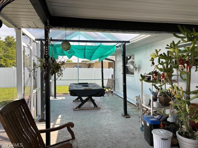 screened lanai, covered pool table