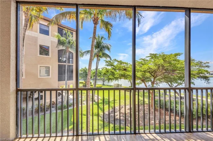 Unfurnished sunroom featuring a water view and healthy amount of natural light