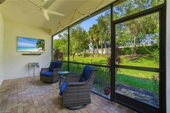 Gorgeous landscaping creates the perfect backdrop for relaxing with a good book