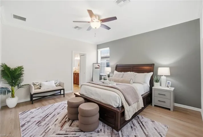 Spacious primary suite featuring a peaceful atmosphere and room for a sitting area.