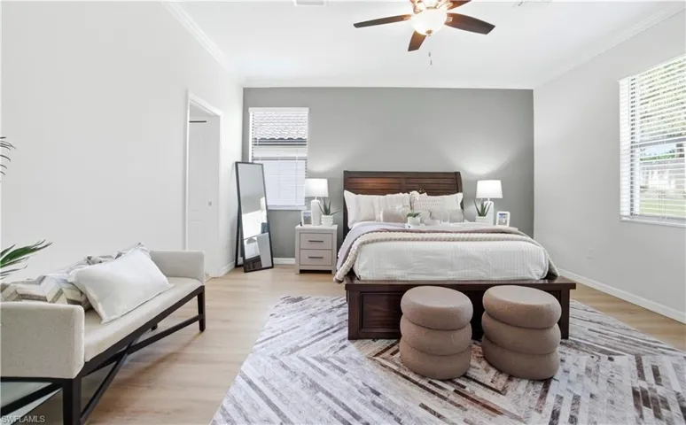 The Primary Suite boasts an abundance of natural light, and plenty of space for comfort
