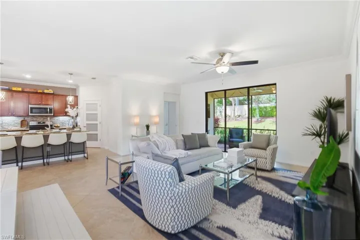 Open and airy living space with neutral finishes, abundant natural light, and flexible layout for entertaining or everyday living.