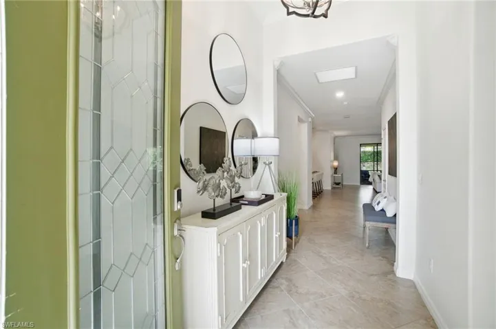 Bright and welcoming entry with natural light and a seamless flow into the main living areas.
