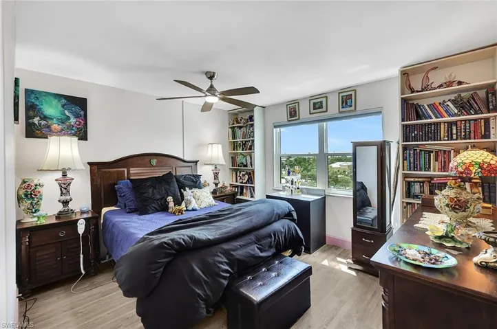 Bedroom featuring light hardwood / wood-style flooring and ceiling fan