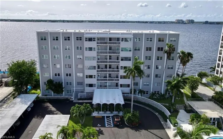 View of building exterior with a water view