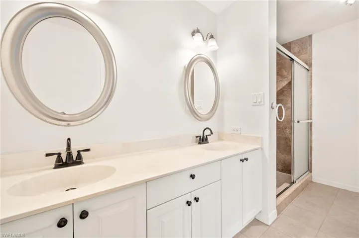 Dual vanities, roomy walk in shower