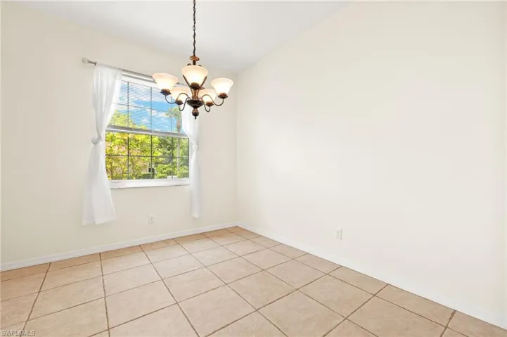 Formal dining room or could be an office/den
