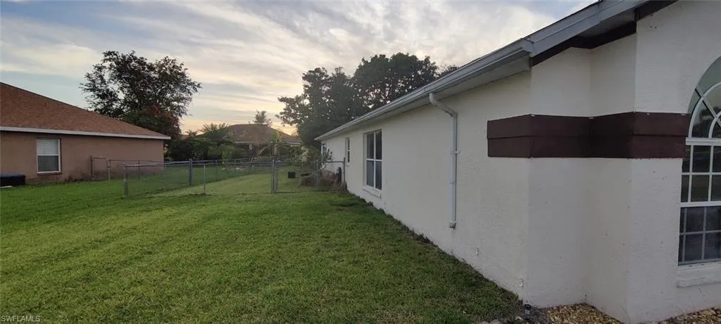 View of yard at dusk