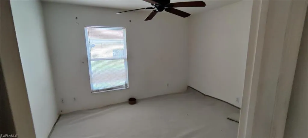 Unfurnished room with ceiling fan