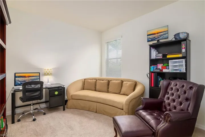 View of carpeted home office