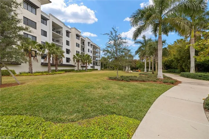 View of home's community featuring a yard
