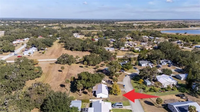 View of property location with a nearby body of water